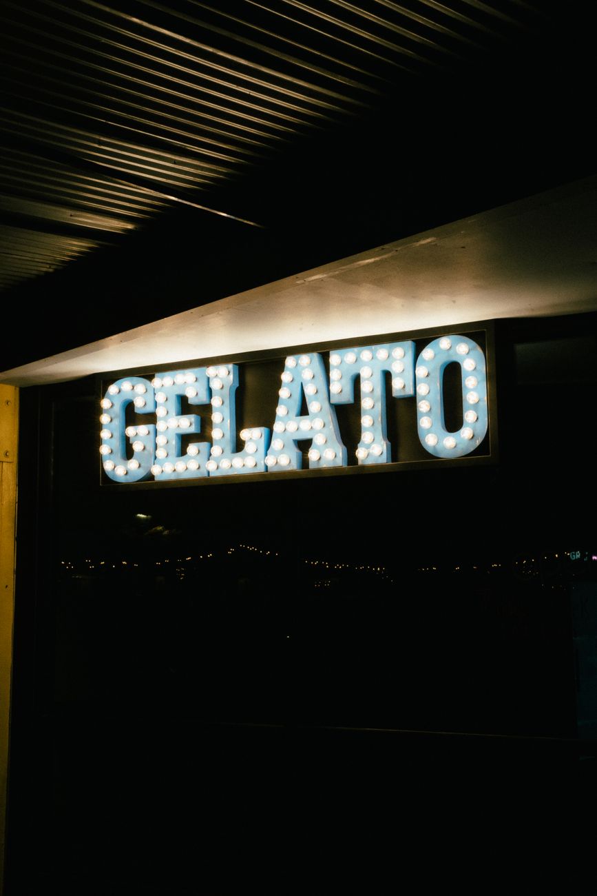 a sign with light bulbs
